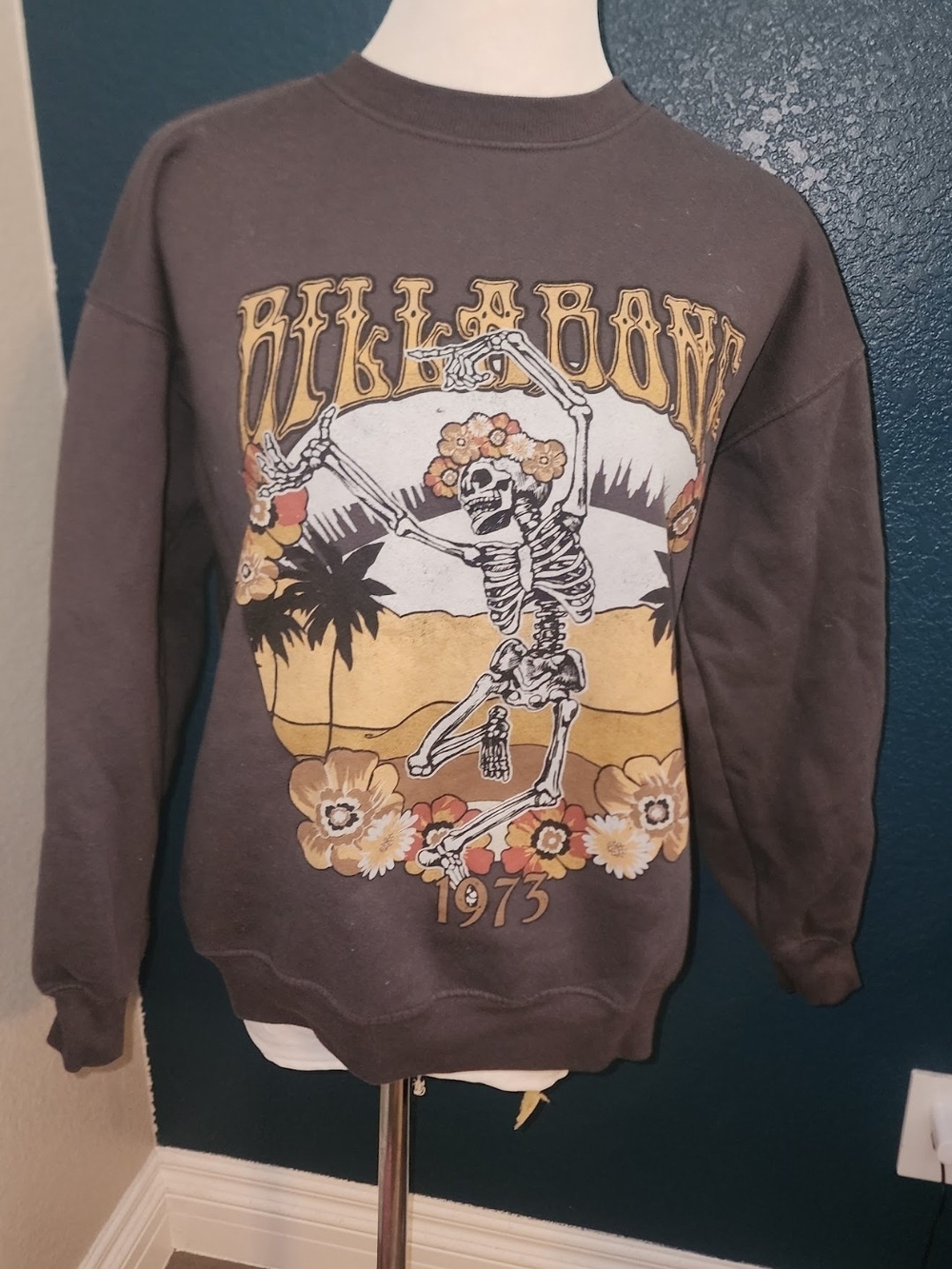 Billabong Black Crewneck Sweater with Yellow & Cream Retro Skeleton Graphic